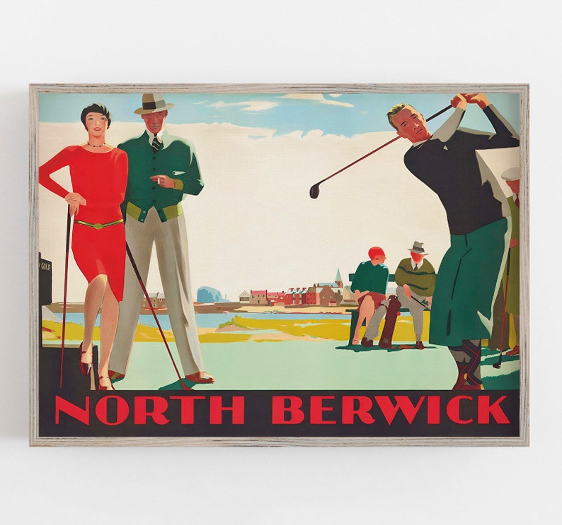 May include: Vintage-style framed print featuring a golf scene with figures in period attire. A woman in a red dress and a man in a green jacket stand near a golf course. The words "NORTH BERWICK" are displayed in bold red letters.