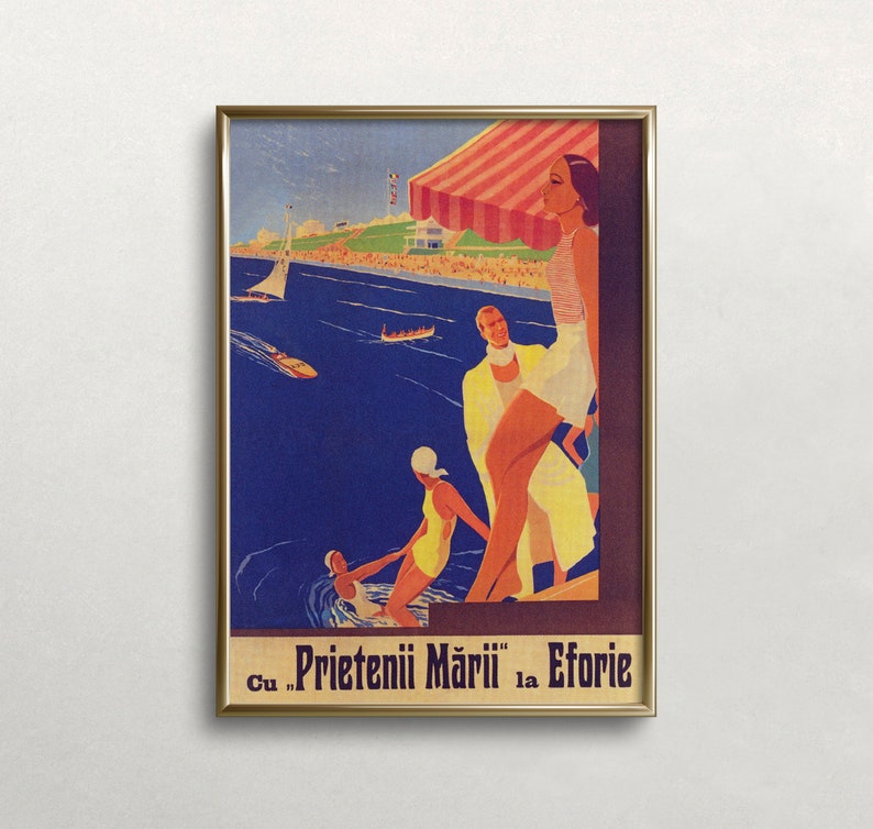 May include: Framed vintage travel poster with a gold frame. The poster depicts a beach scene with people, boats, and a striped awning. The text at the bottom reads "Cu Prietenii Mării la Eforie."
