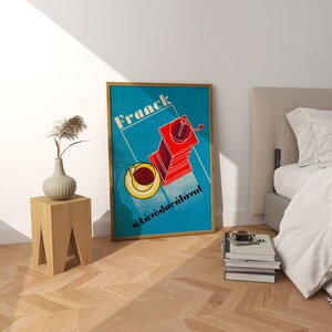 May include: A blue and red vintage poster with the text "Franck a k&aacute;v&eacute;dar&aacute;l&oacute;val" and an illustration of a red coffee grinder with a cup of coffee.
