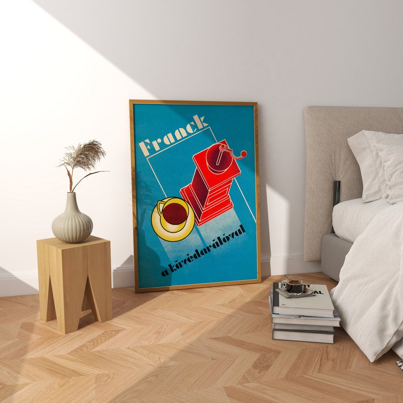 May include: A blue and red vintage poster with the text "Franck a k&aacute;v&eacute;dar&aacute;l&oacute;val" and an illustration of a red coffee grinder with a cup of coffee.