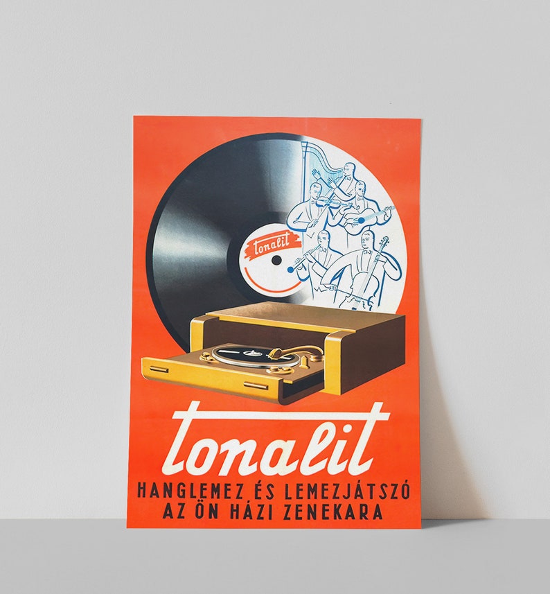 May include: A vintage advertisement for a record player called "Tonalit". The ad features a red background with a black vinyl record, a record player, and a cartoon illustration of a string quartet. The text reads "Tonalit, Hangl&egrave;mez &eacute;s Lemezj&aacute;tsz&oacute; Az &Ouml;n H&aacute;zi Zenekara".