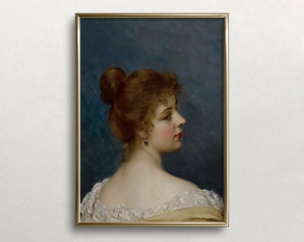 May include: Framed vintage portrait of a woman in profile. The artwork features a woman with auburn hair styled in a bun, wearing a white dress with lace detailing. The background is a dark blue, and the frame is gold.