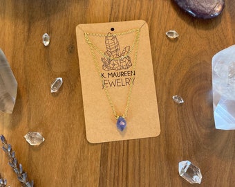 Faceted tanzanite necklace on 14k gold filled 18” chain.