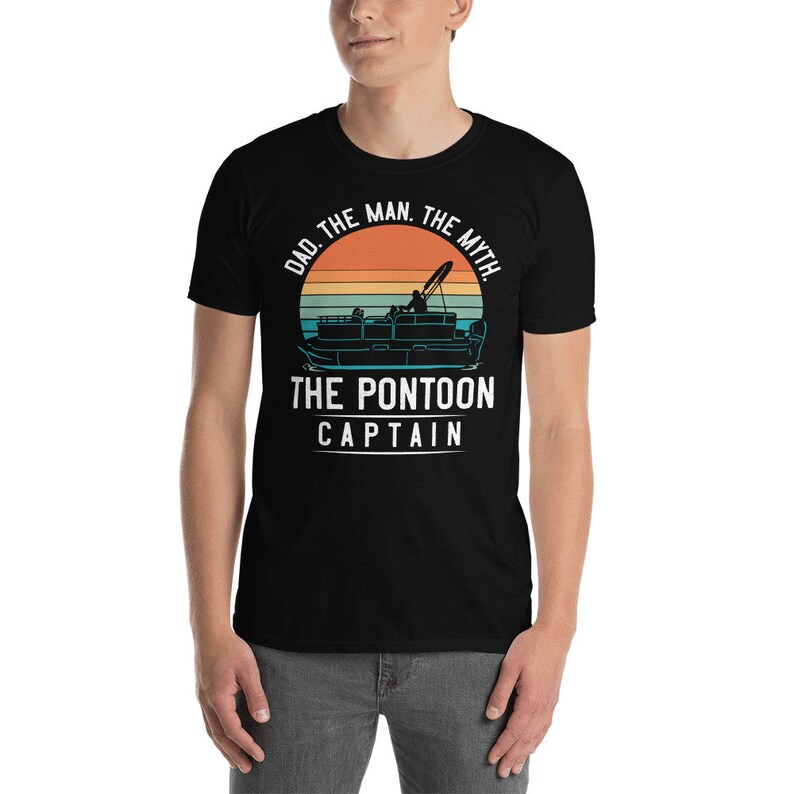 May include: Black t-shirt with a retro sunset graphic and the text "Dad. The Man. The Myth. The Pontoon Captain."