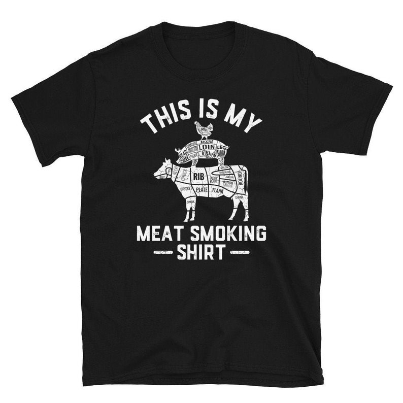 May include: Black t-shirt with a white graphic of a pig and cow with labeled cuts of meat. The text "This is my meat smoking shirt" is printed below the graphic.