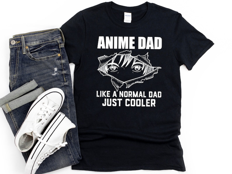 May include: Black t-shirt with white text that reads "Anime Dad Like a Normal Dad Just Cooler". The text is surrounded by a white image of an anime character's eyes peeking out of a ripped hole in the shirt.