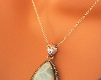 Larimar blue pendant with pave topaz in oxidized silver on sterling silver chain.