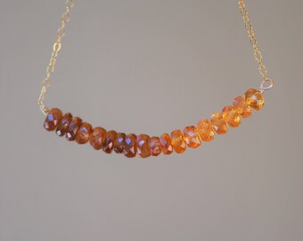 Warm brown zircon and orange spessartite garnet bar necklace on solid 14k gold chain