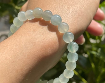 Genomskinligt jadeitarmband - Äkta naturlig burmesisk jadeitjade typ A Genomskinligt mjukt grönt pärl-töjbart armband