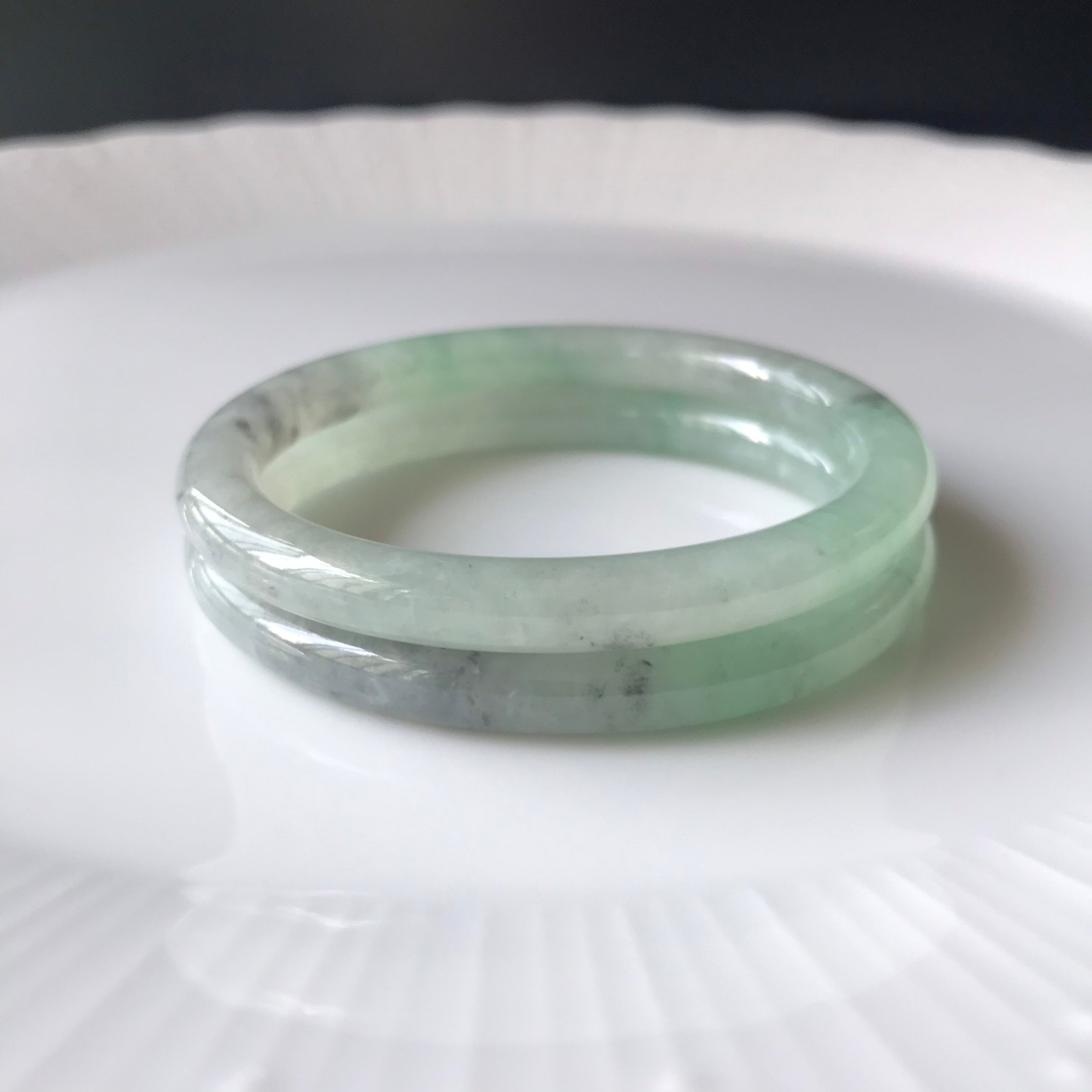 52mm Oval Jade Bangle - Translucent Green With Natural Ash 52mm Oval Jade Bangle - Translucent Green With Natural Ash