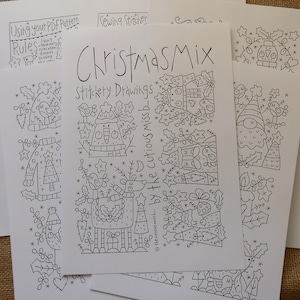 May include: Black and white line art drawings of Christmas themed illustrations. The drawings include a snowman, a reindeer, a Christmas tree, a bird, and a gnome. The text "Christmas Mix" and "Stitchery Drawings" is included in the image.