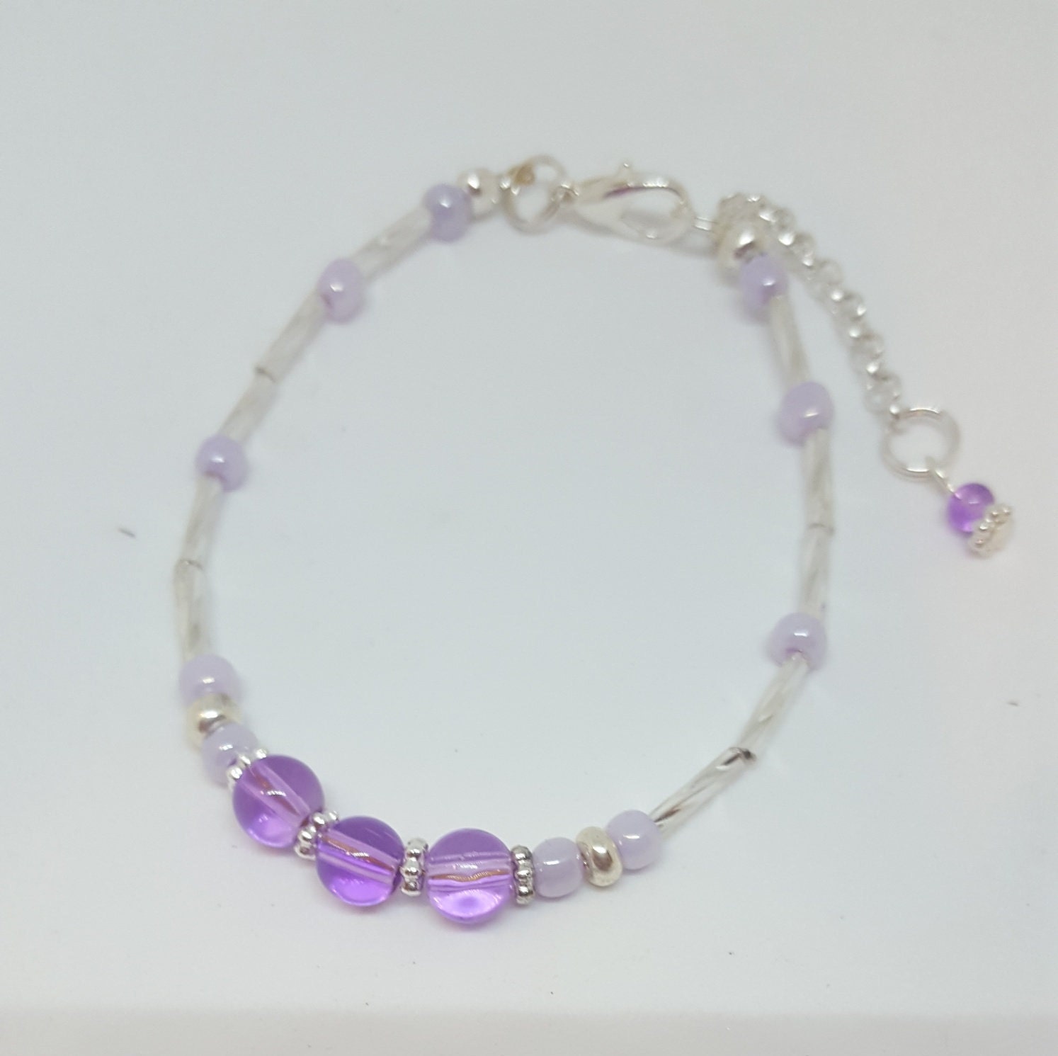 Light purple and dark purple clay beaded bracelet