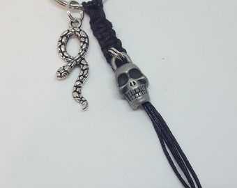 Serpente e teschio chiave catena