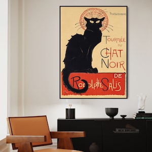 May include: Vintage poster advertising the "Tournée du Chat Noir" cabaret, featuring a black cat with a red background and the text "Prochainement de  Rodolphe Salis".