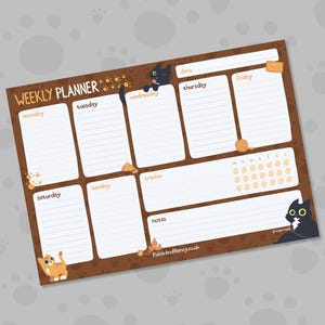 May include: A brown weekly planner with white lined sections for each day, plus a tracker and notes section. The planner features cartoon cat illustrations and the text "WEEKLY PLANNER". The website "PickleAndNancy.co.uk" is also visible.