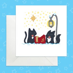 Carte de Noël drôle avec des chats noirs, carte de vœux de chats noirs, carte de Noël de chats chantant des chants de Noël, carte de Noël drôle avec des chats mignons