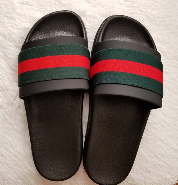 red and brown gucci slides