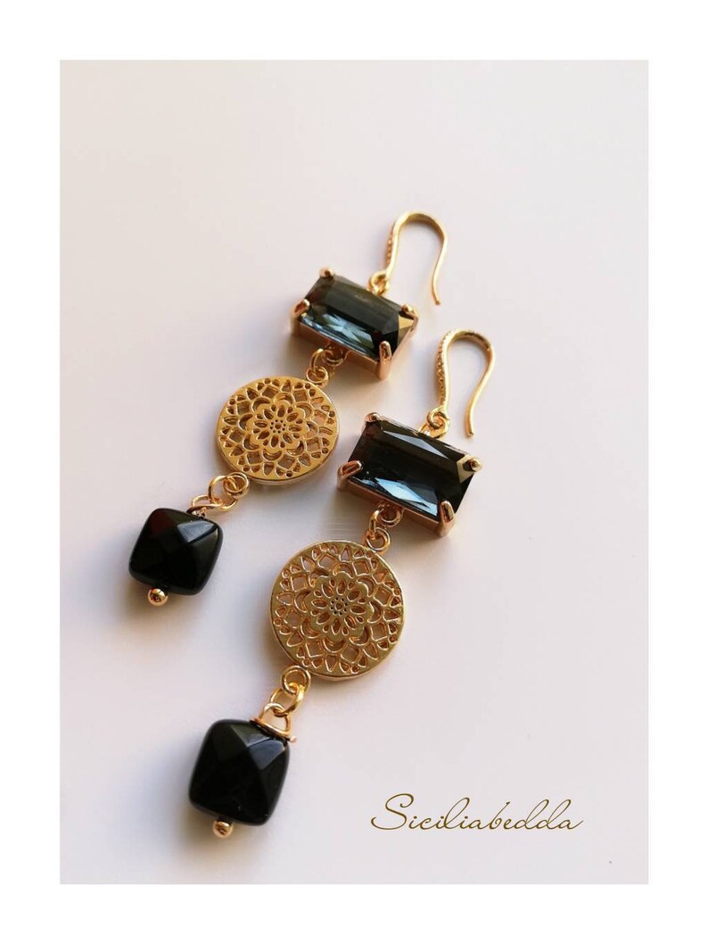 Earrings with black zircons