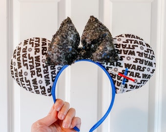 Orejas de Minnie Mouse de Star Wars, lazo de lentejuelas, detalle de sable láser
