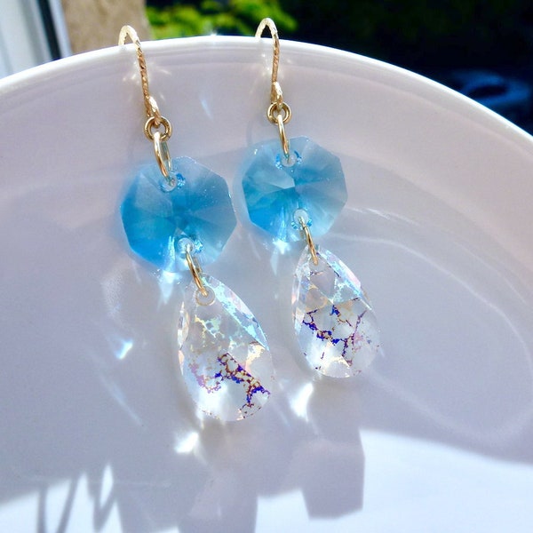 Two-tone 14k gold filled gold earrings in Aquamarine blue and white Swarovski crystals with white patina rainbow reflections