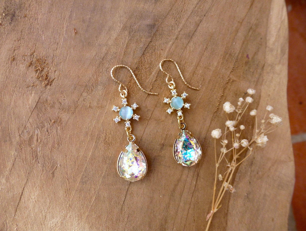 Boucles D'oreilles Pendantes étoiles En Verre Irisée - Vert Et Rose - Occasion Bon état