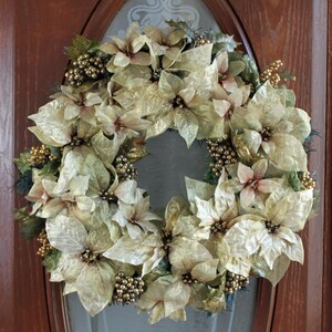 Christmas  Evergreen Wreath with White Poinsettias, Berries and  Leaves.  Holiday Wreath.  Winter Wreath.