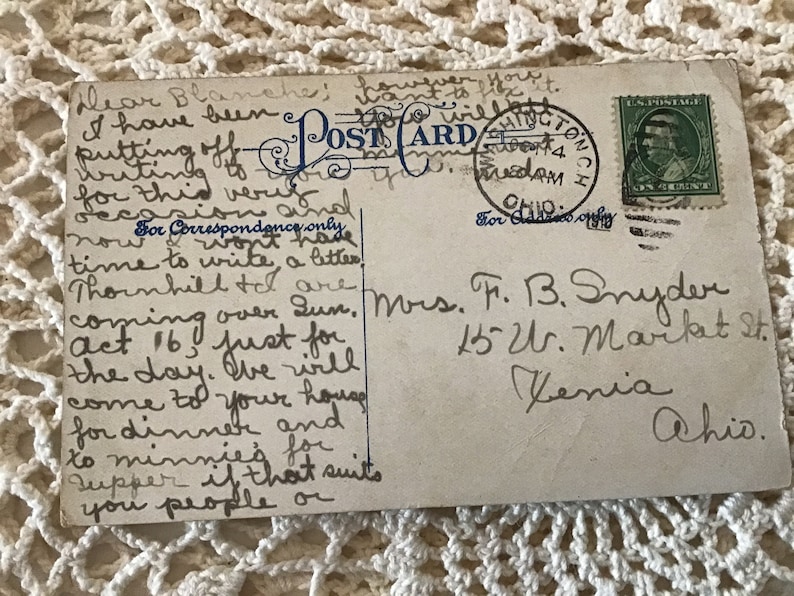 May include: A vintage postcard with a handwritten message. The postcard is addressed to Blanche and mentions a visit on Sunday, August 16th. The postcard is from Mrs. F. B. Snyder, 15 W. Market St., Xenia, Ohio.