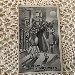 May include: Black and white illustration of four dogs dressed in clothing. The dog in the center is kissing another dog on the cheek. The caption reads "What do we care what the neighbors say".