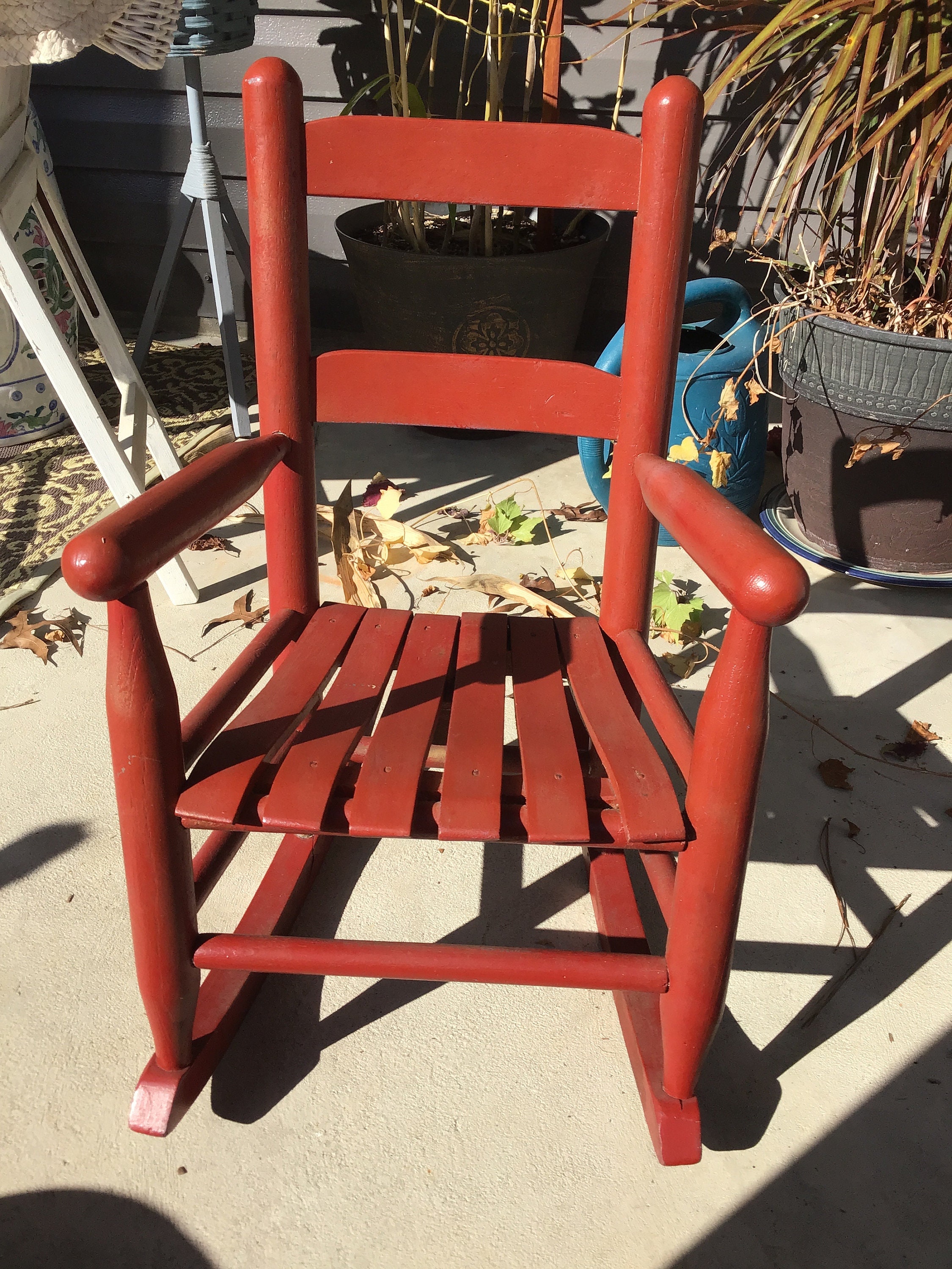 Childs red top rocking chair