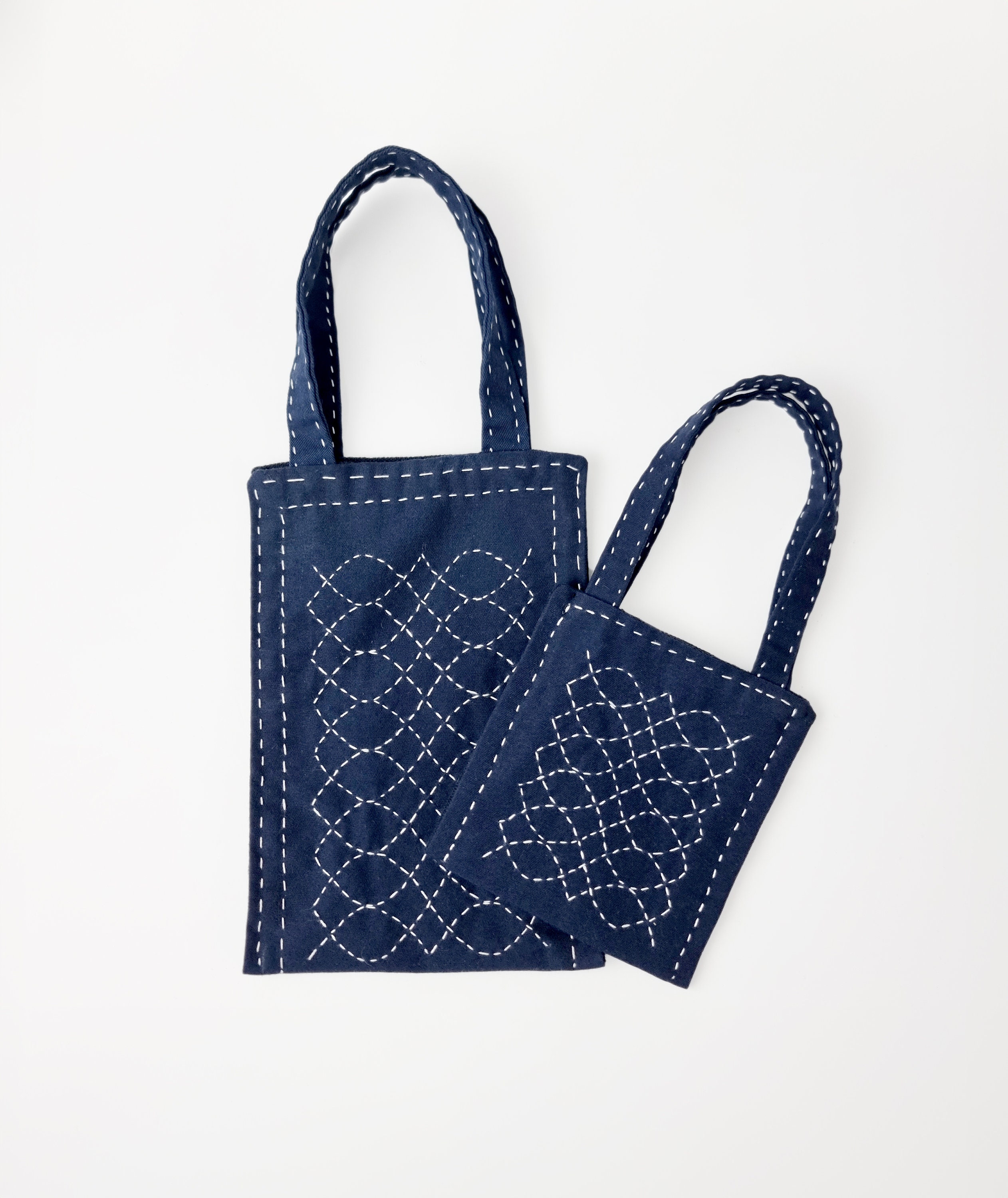 Handmade Sashiko mini tote bags/ Ideal as a phone holder or as a case for a portable hard driver.