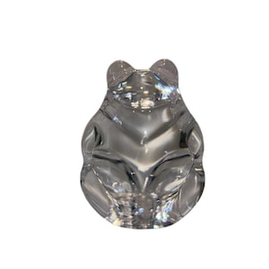 May include: A set of three ceramic mugs with a speckled, matte finish. The mugs are in shades of cream, light gray, and dark gray. Each mug has a simple, minimalist design and a rounded handle.