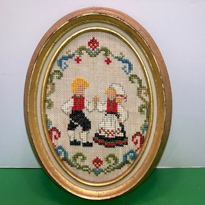 Vintage Dutch Cross Stitch, Gold Framed Oval Cross Stitch, Framed Dutch Couple Cross Stitch, 8 1/2&quot; tall 6 1/2&quot;, Paper Lined Cross Stitch