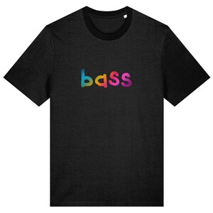 May include: A black t-shirt with a rainbow colored word "bass" printed on the front.