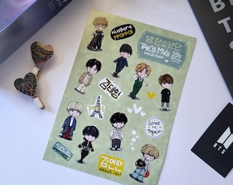 May include: A set of 12 stickers featuring cartoon illustrations of a K-pop boy band member. The stickers are on a green background with white hearts and text in Korean. The text includes "Tae's MVS Collection", "Niagara Ppoppo!" and "Love Me Again".