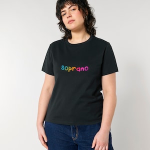 May include: A black t-shirt with a rainbow colored "soprano" logo printed on the front.