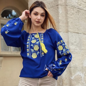 Blue embroidered chiffon blouse Ukrainian shirt with traditional floral design. Vyshyvanka shirt with folk embroidery.