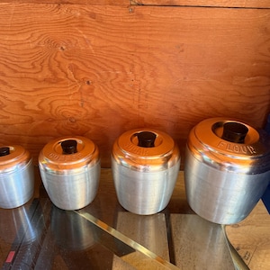 Set of 4 canisters spun aluminum with copper lids vintage 1950&#39;s 1969s Flour Sugar Coffee Tea