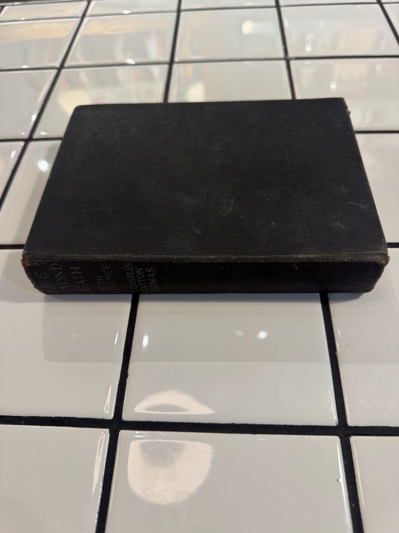 May include: A white ceramic mug with a black handle and the text "But First, Coffee" in a bold, black font. The mug is likely 11 ounces in size, perfect for a morning beverage.