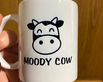 moody cow mug