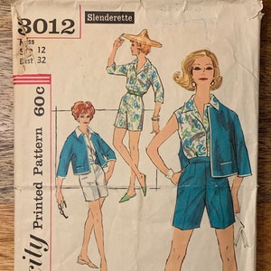 May include: Simplicity Printed Pattern 60C, a vintage sewing pattern for a sleeveless blouse and shorts outfit. The pattern is for Misses sizes 12 and bust 32. The pattern features three illustrations of women wearing the outfit in different poses.