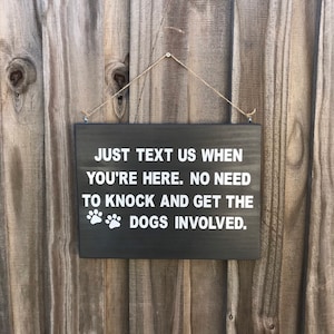 Just text us when you&#39;re here  no need to knock and get the dogs involved/door sign/hanger