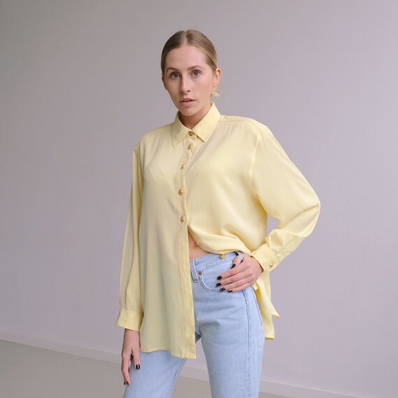 yellow button up top