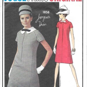 May include: Vintage Vogue Paris Original sewing pattern with two dress designs. One dress is a black and white checked pattern with a white collar. The other is a solid red dress. The pattern is labelled "1858 Jacques Heim".