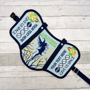 May include: A blue and navy blue fabric dog collar with a whimsical design featuring a fairy, flowers, and the text "A Midsummer Night's Dream". The collar has two adjustable straps and the text "Your Text Here" and "Give Us Space" on each side.