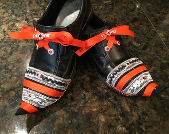 Tot girls size 11 “Arsenic and Old Lace” witch loafer in orange white black and silver with grosgrain ribbon faux laces. Ric rac fun!