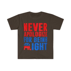 May include: A brown t-shirt with the text "NEVER APOLOGIZE FOR BEING RIGHT" in red and blue. A red, white, and blue elephant graphic is below the text.