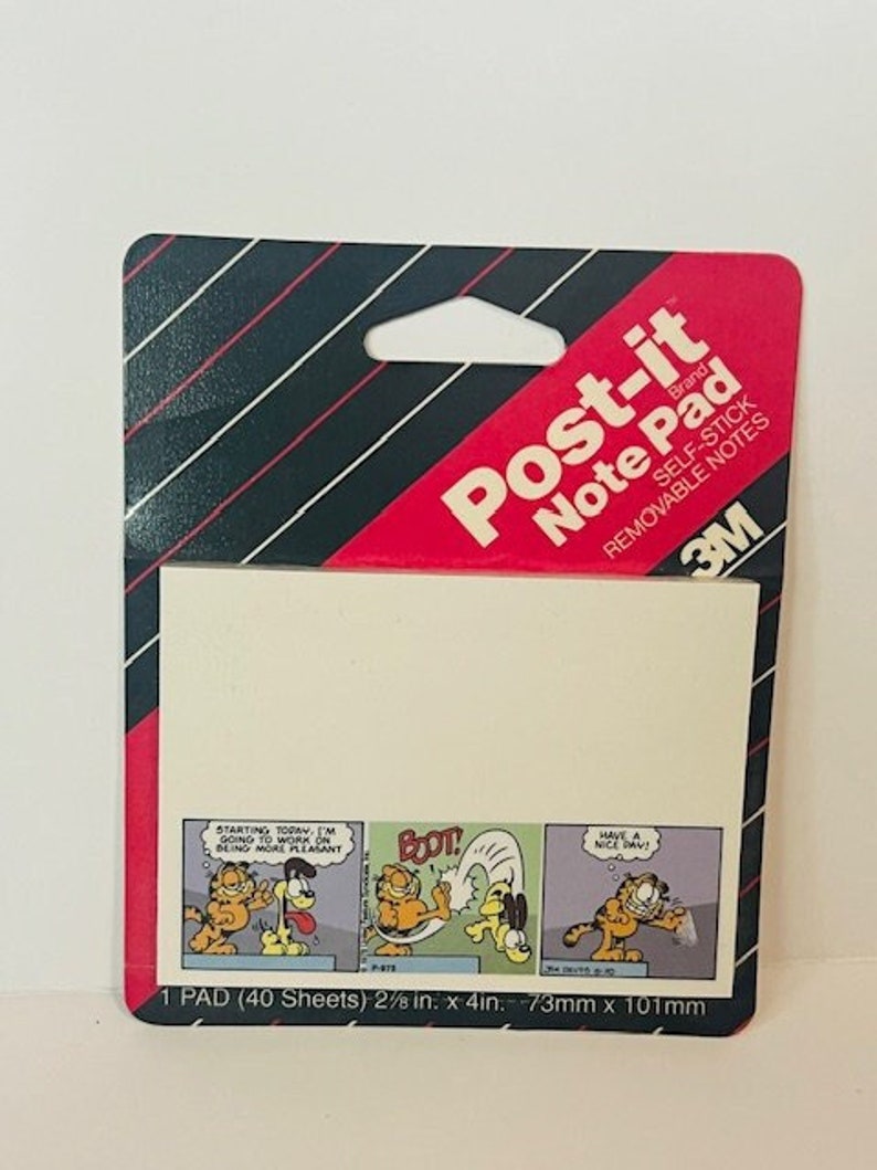 May include: A pack of 40 Post-it Brand Note Pad self-stick removable notes featuring a Garfield comic strip. The pad is 2 1/8 inches by 4 inches or 73mm by 101mm.