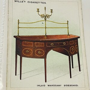 May include: A vintage illustration of an inlaid mahogany sideboard with a brass candle stand. The image is from a Wills's Cigarettes card and includes the text "WILLS'S CIGARETTES" and "INLAID MAHOGANY SIDEBOARD."