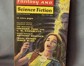 May include: Vintage November issue of "The Magazine of Fantasy and Science Fiction." The cover features a woman with long hair, a yellow and blue dress, and a futuristic design. The magazine's title is in red and yellow, with the issue's contents listed below.