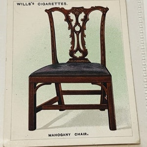 May include: A vintage advertisement for Wills's Cigarettes featuring a mahogany chair with a carved back and a dark brown seat. The text "Wills's Cigarettes" and "Mahogany Chair" are printed below the image.
